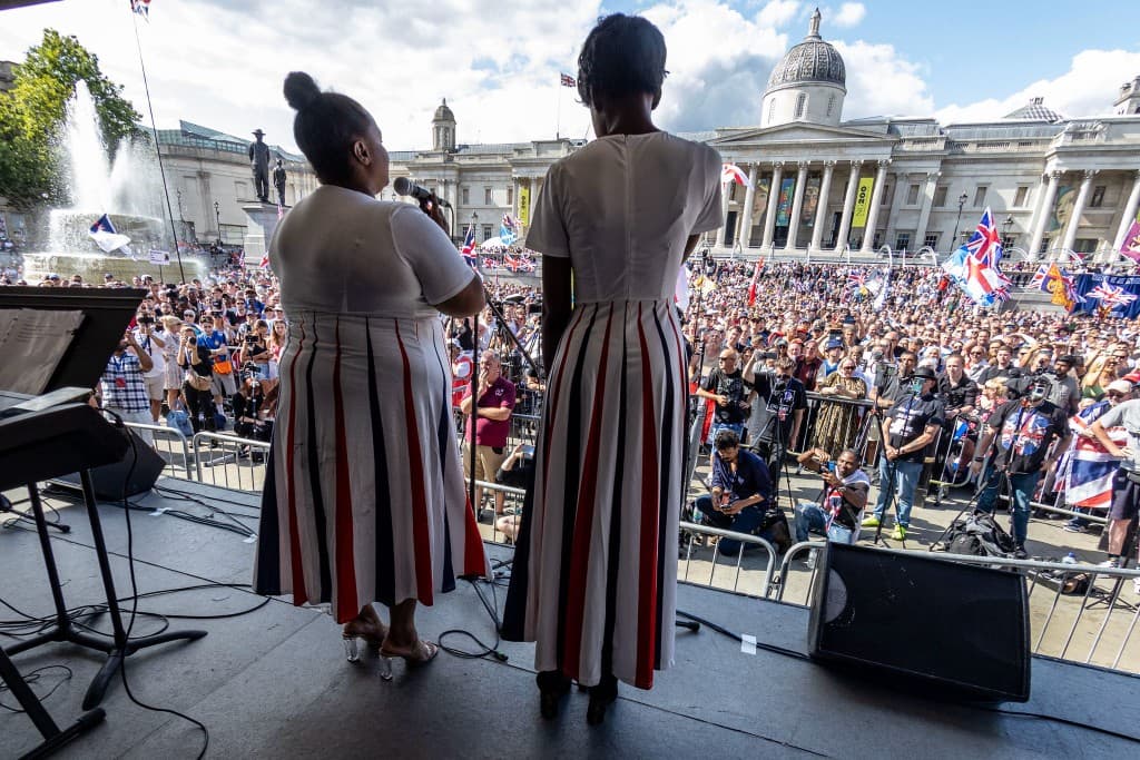 UTK performers on stage at Trafalgar Square facing a massive crowd